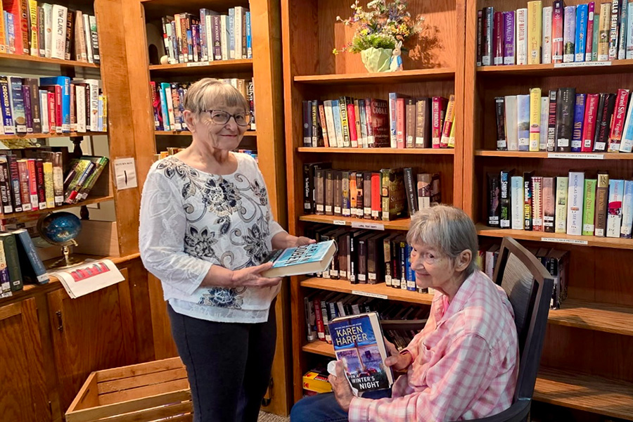 Residents Kelly and Carol Share Their Love of Reading at Arbor View Library